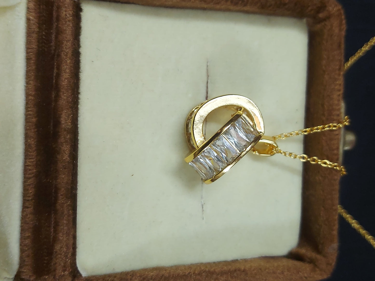 Graceful Charm: Classic Pendant with Matching Earrings