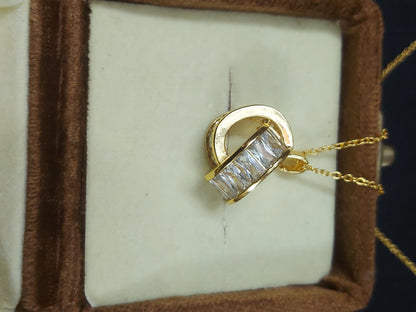 Graceful Charm: Classic Pendant with Matching Earrings